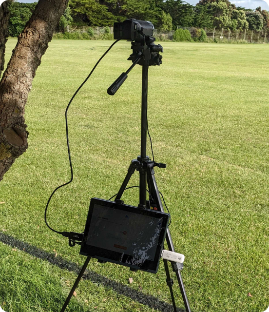 The My Action Sport StreamKit setup near a cricket pitch